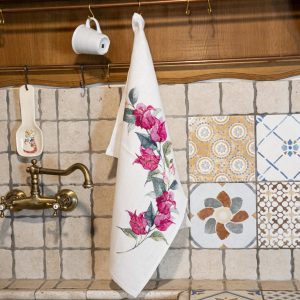 CANOVACCIO CON RAMO PIEGATO CON 6 FIORI DI BOUGAINVILLE